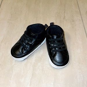 Baby Boy black and white sneakers from Macy’s